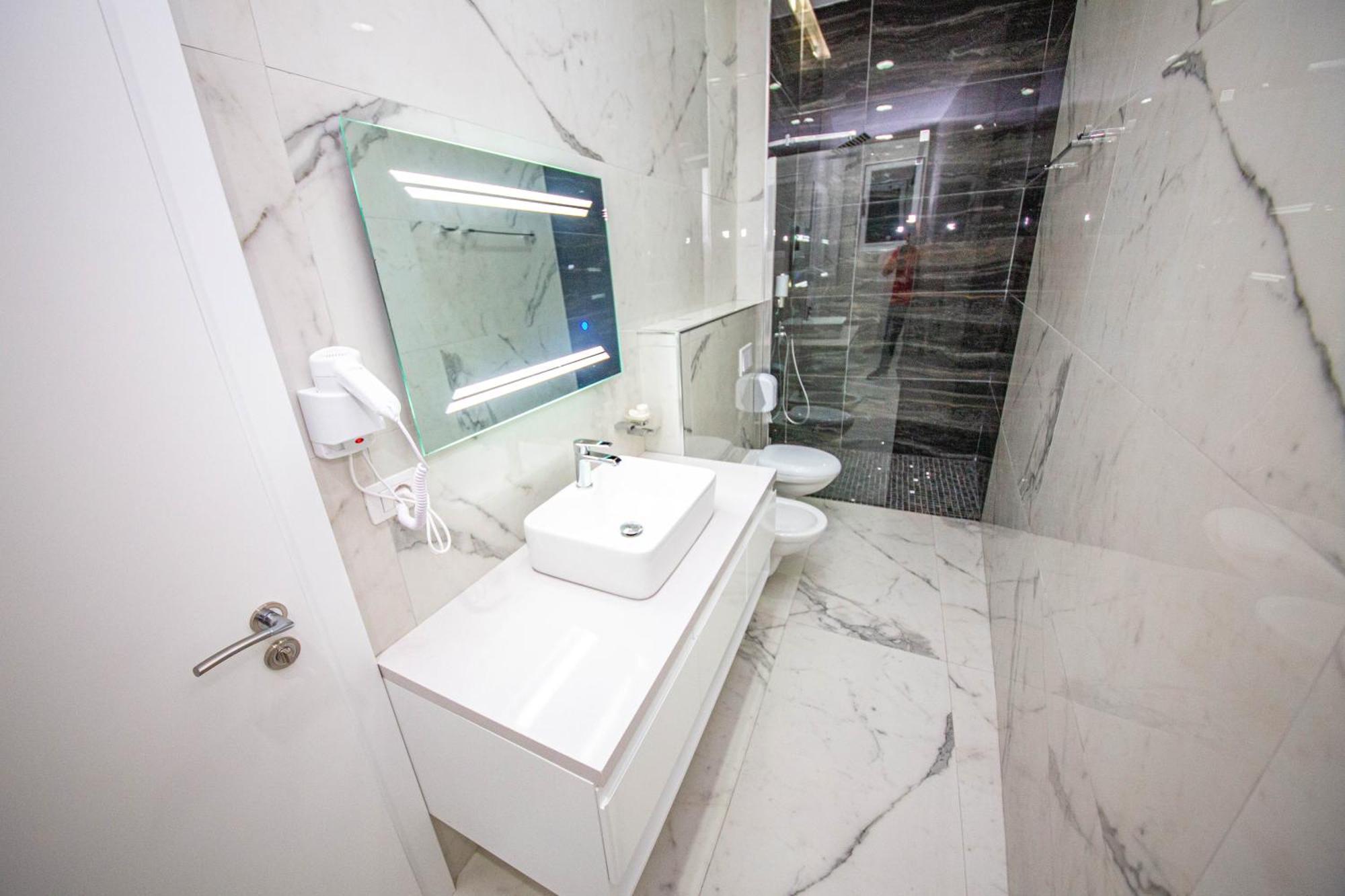 Noan Hotel & Resort Дхерми Номер фото