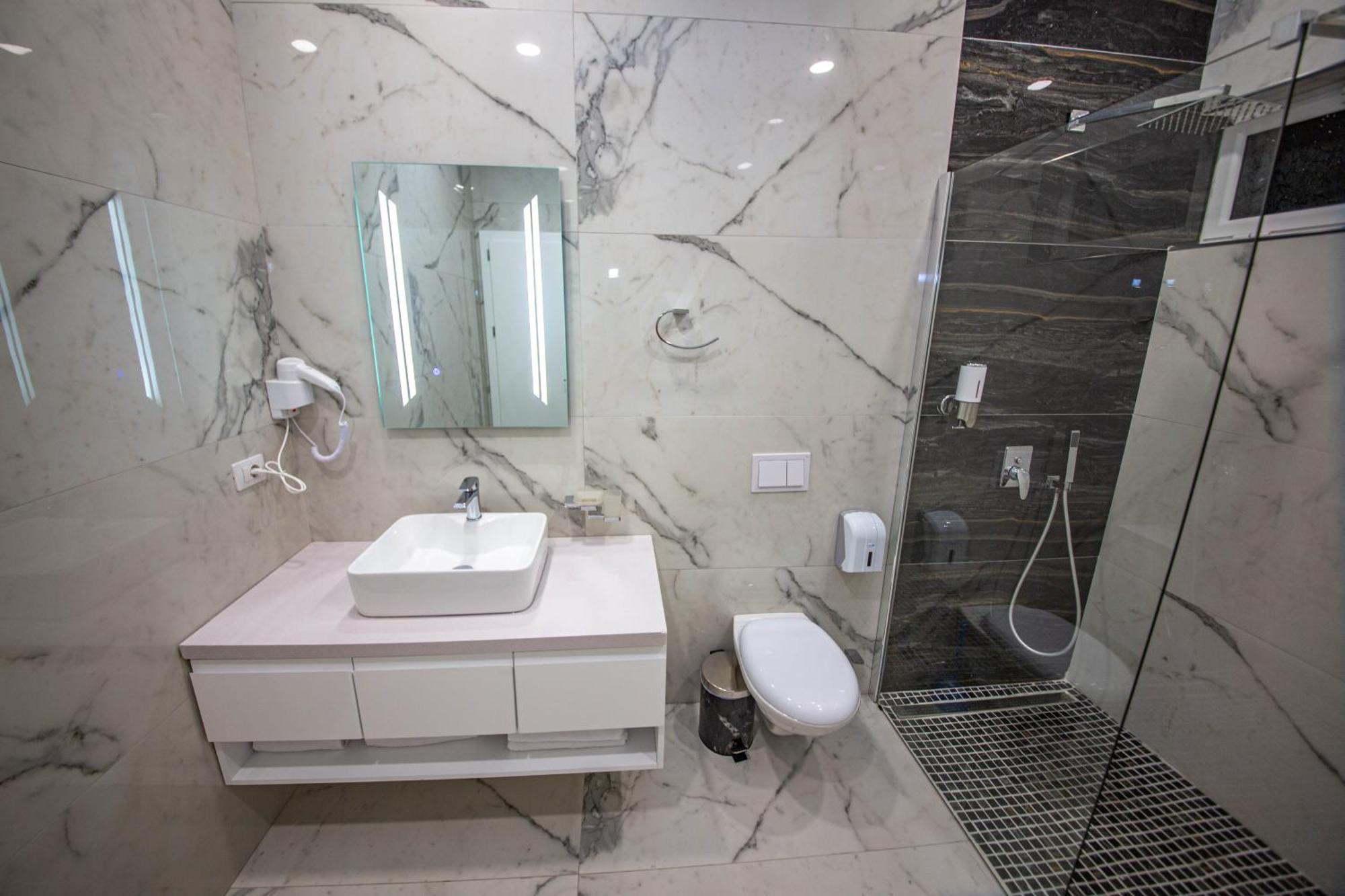 Noan Hotel & Resort Дхерми Номер фото